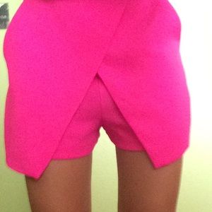 Women’s hot pink dressy shorts.